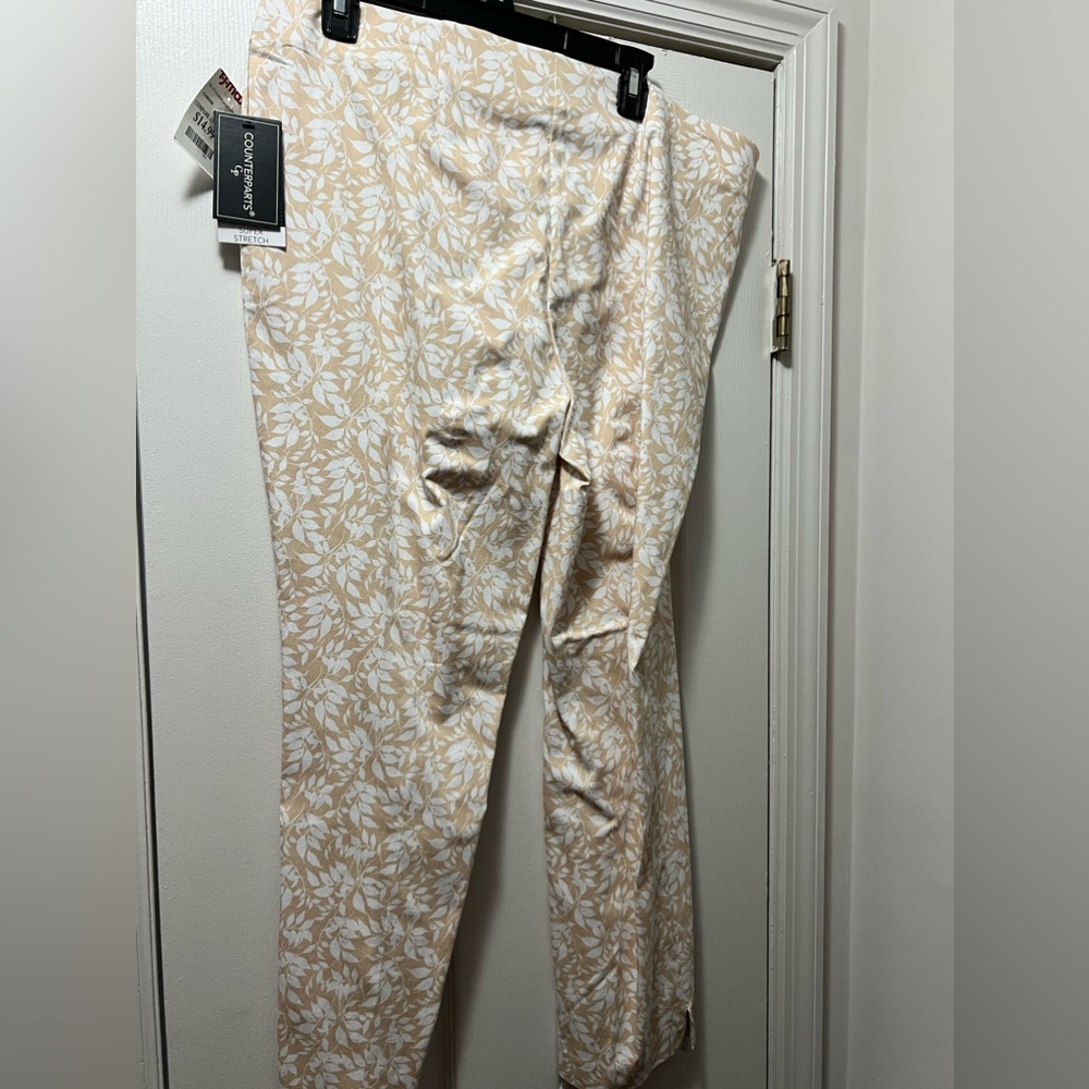 NWT beige and white stretchy pants.